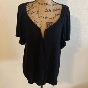Black shirt flutter sleeve top